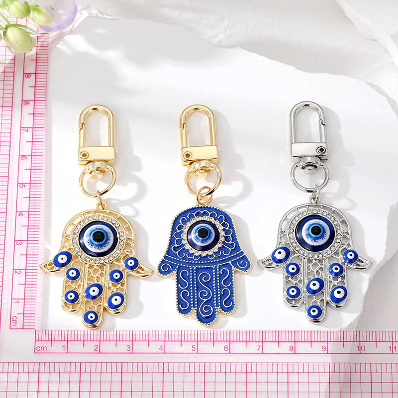 Bling Hollow Evil Eye Hamsa Hand Keychain Key Ring For Women Men Zircon Fatima Hand Blue Eye Bag Car Airpods Box Key Accessories